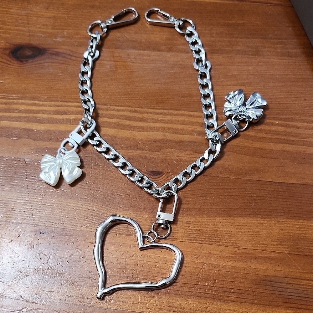 Silver Bag Charm With Double Clasp Heart And Bows